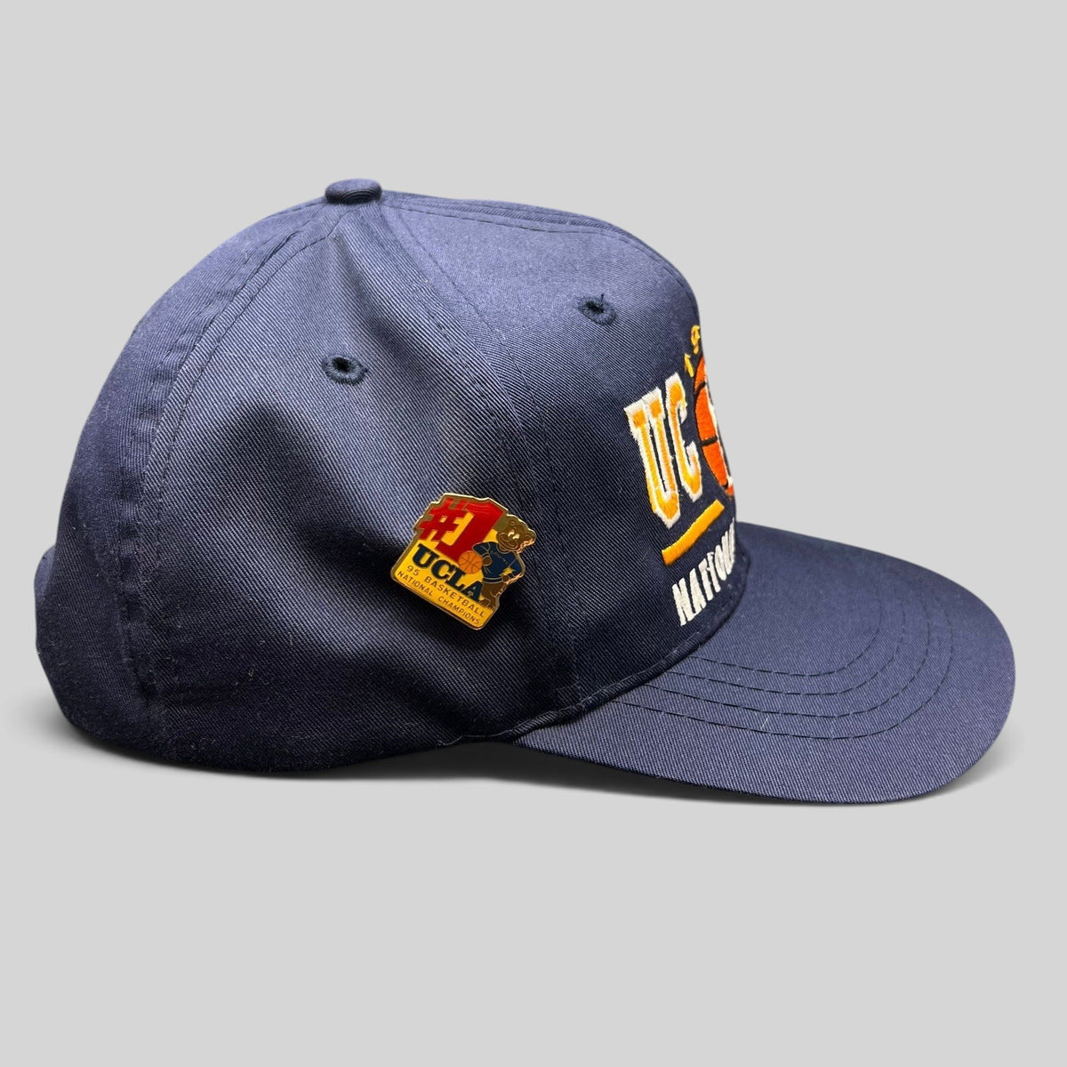 Raree Finds vintage 1995 UCLA National Champions navy blue snapback hat with embroidered basketball and team graphics