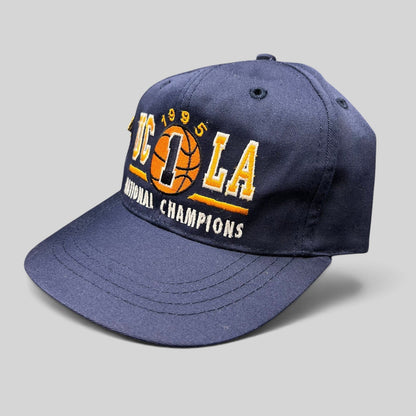 Raree Finds vintage 1995 UCLA Bruins National Champions navy blue snapback hat with embroidered basketball graphic