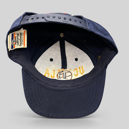 Raree Finds vintage 1995 UCLA National Champions snapback hat interior showing California Headwear tag and embroidery