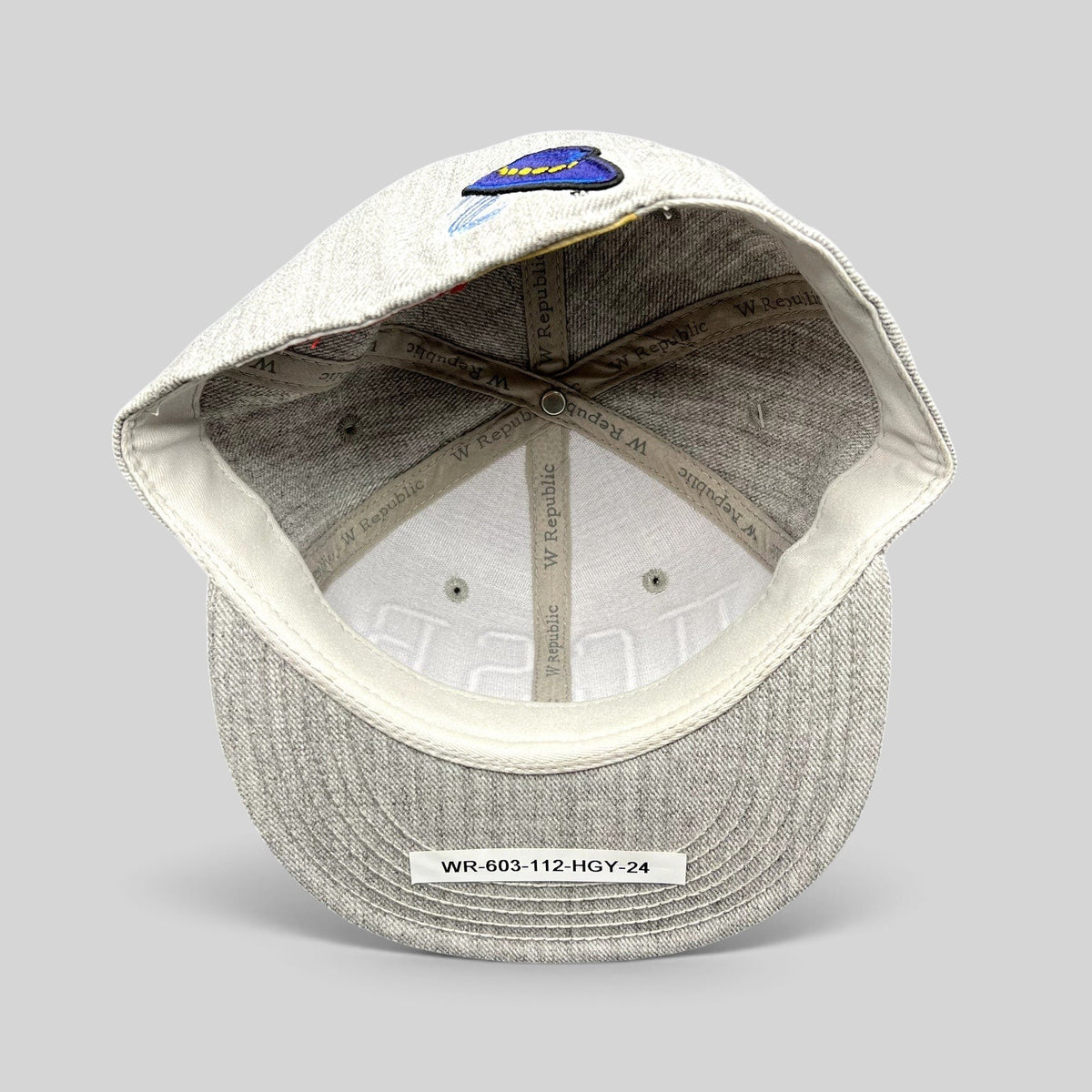 Raree Finds UCSB Gauchos fitted hat interior showing heather gray fabric, W Republic branding, and blue logo patch.
