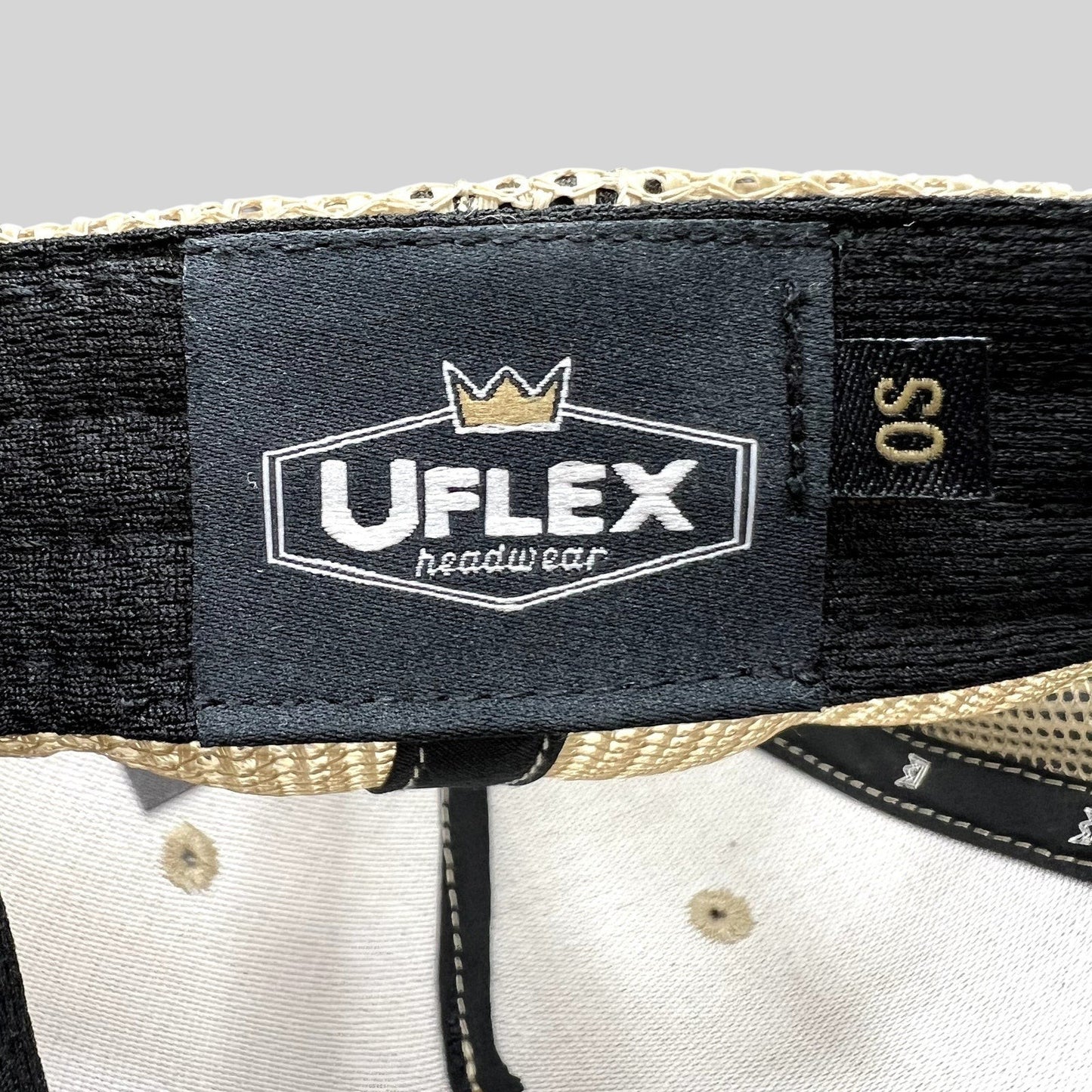 Raree Finds UFlex interior label and OS size tag inside a cream corduroy trucker hat with beige mesh panels