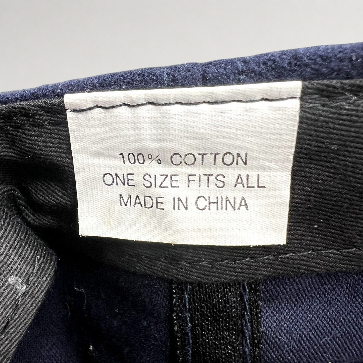 Raree Finds vintage UGG Australia hat interior label showing 100 percent cotton and made in China text
