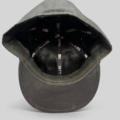 Raree Finds Undefeated New Era 59FIFTY fitted hat interior showing branded taping and structured crown construction