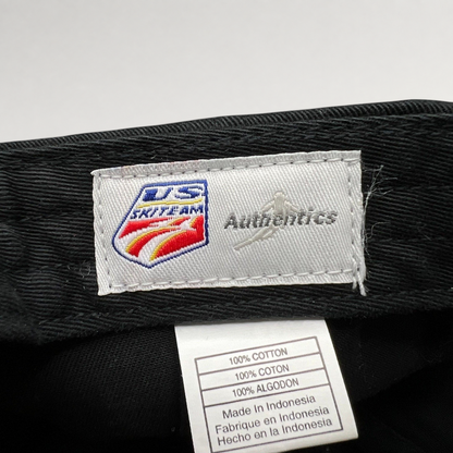 Raree Finds vintage 2006 USA Ski Team hat interior label showing Authentic USA branding and cotton fabric tag