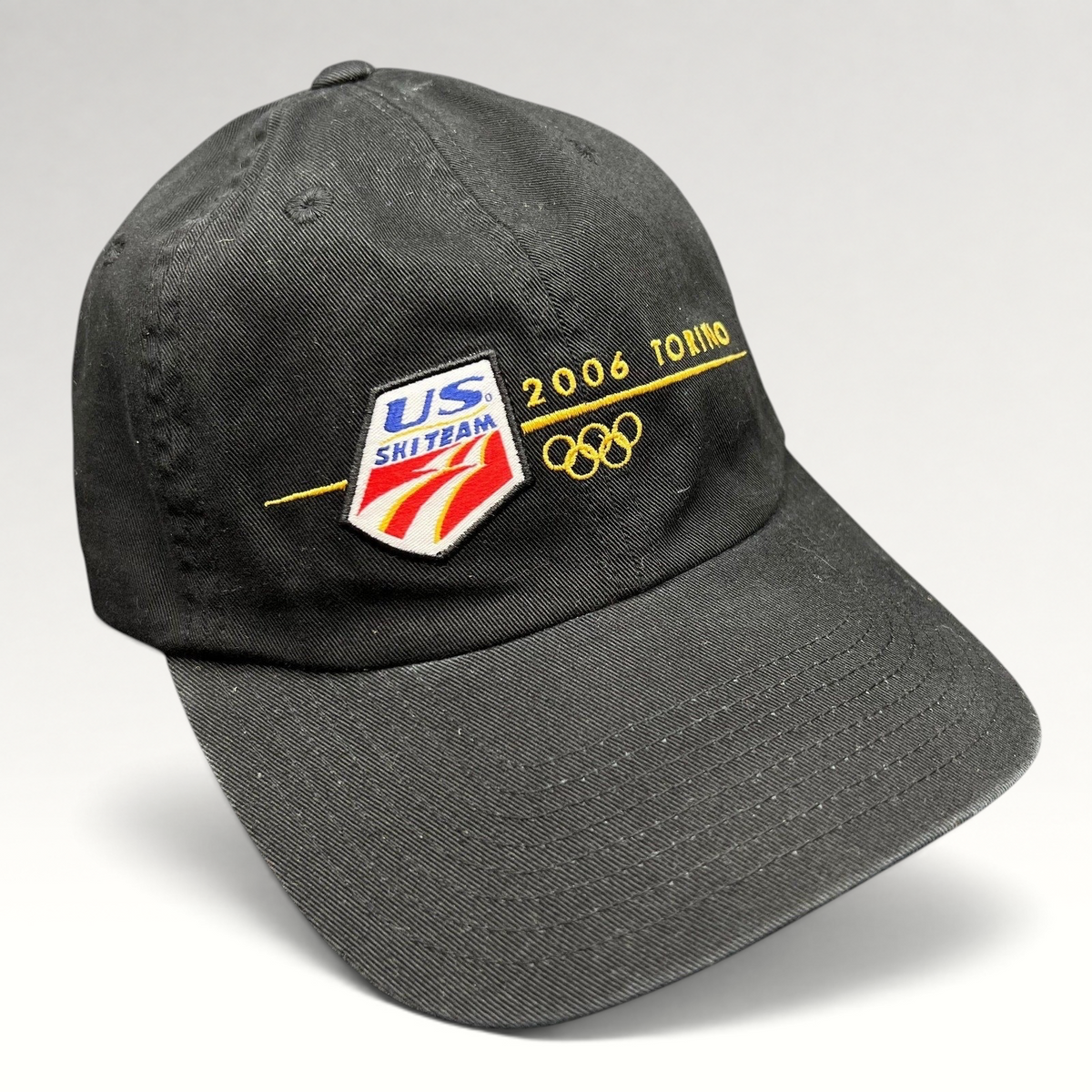 Raree Finds vintage 2006 USA Ski Team Torino Olympics black cotton strapback hat with gold embroidered logo