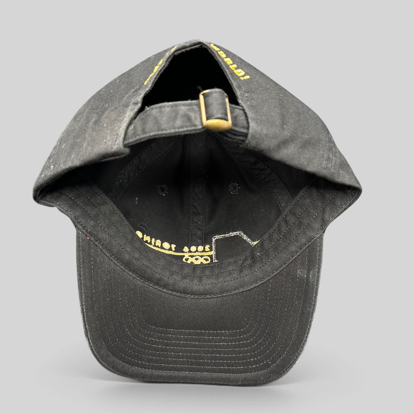 Raree Finds vintage 2006 USA Ski Team Torino Olympics black cotton strapback hat with gold embroidery and metal buckle