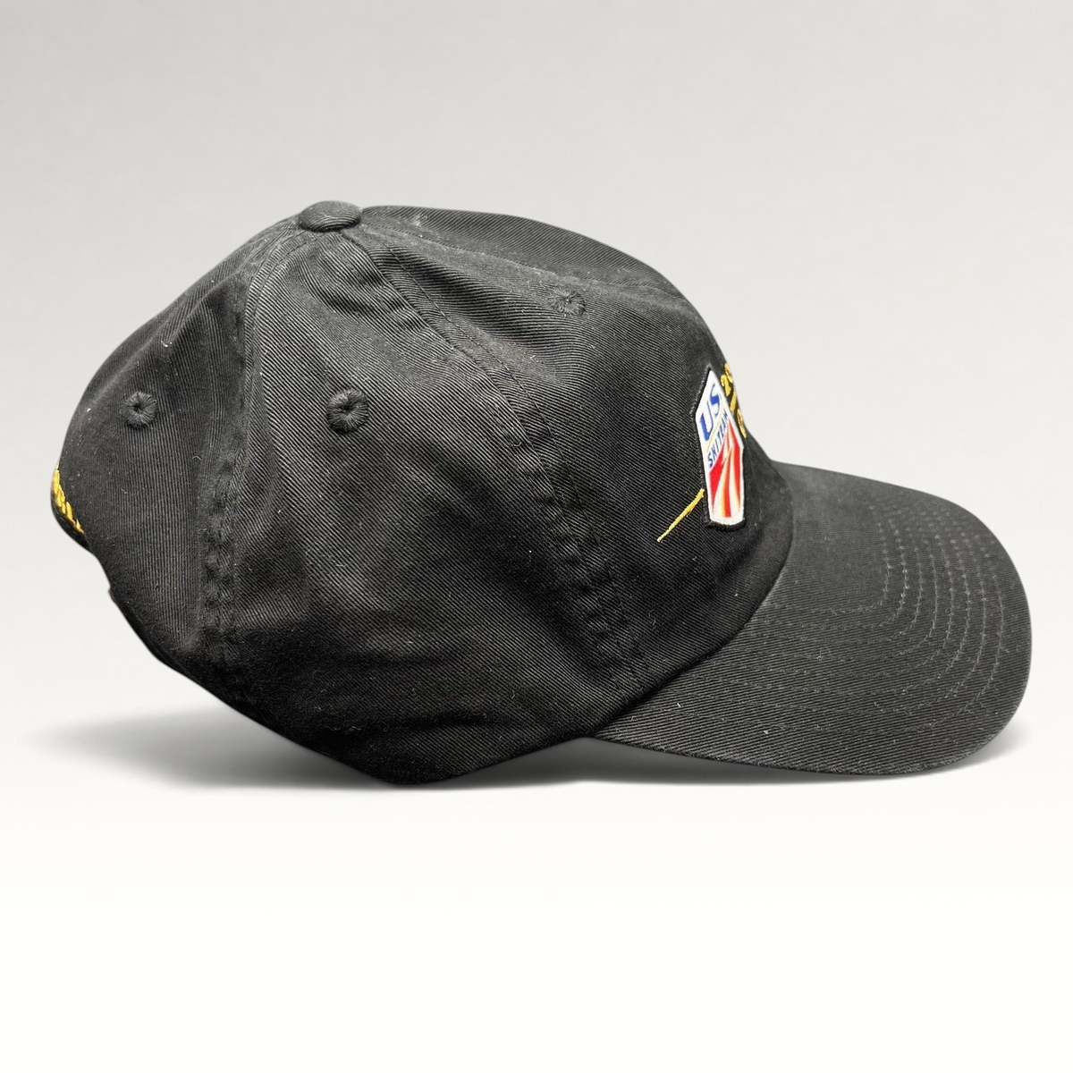 Raree Finds vintage 2006 USA Ski Team Torino Olympics black cotton strapback hat with gold and red shield embroidery