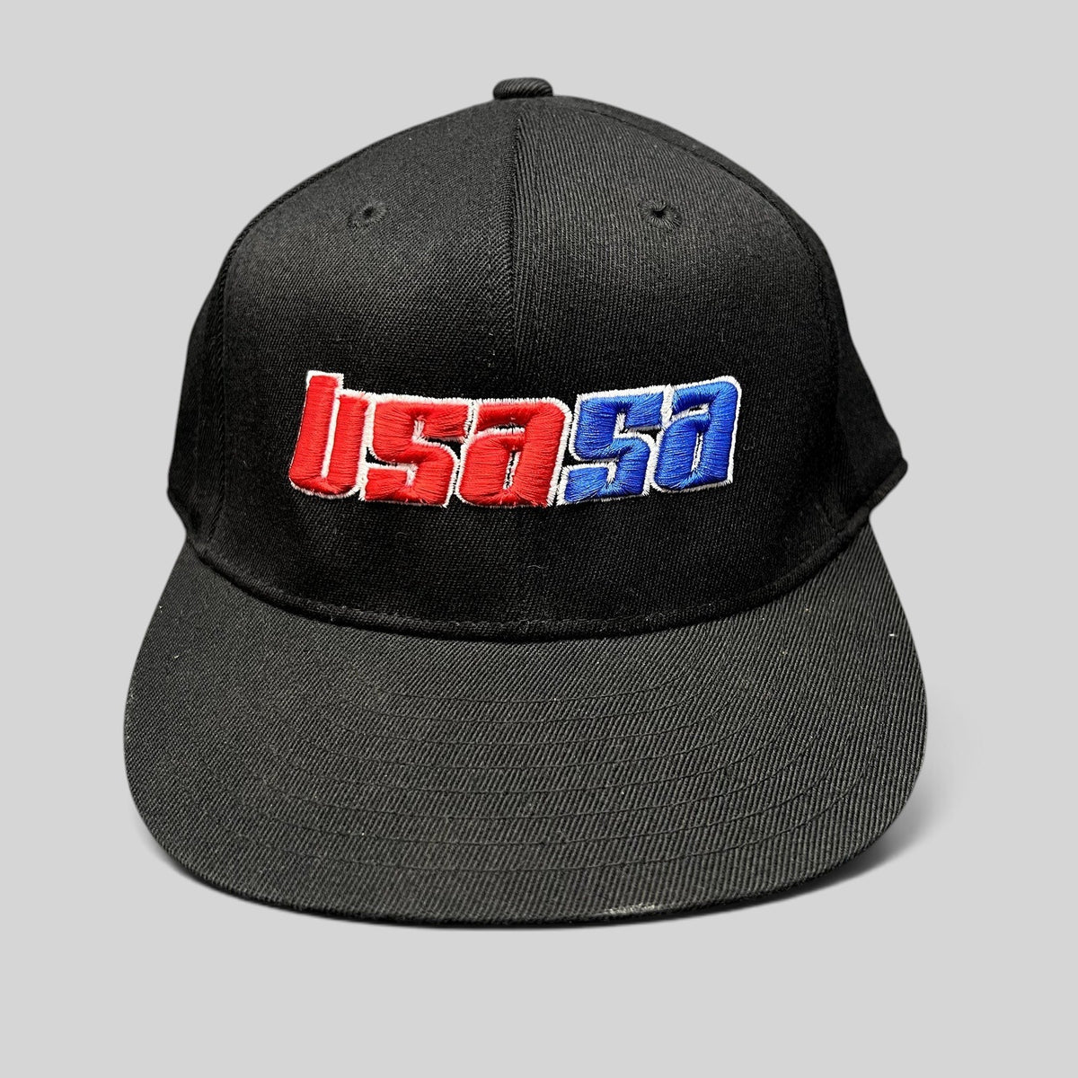 Raree Finds black Flexfit hat featuring embroidered red and blue USA50 logo from 2011 USASA National Championships