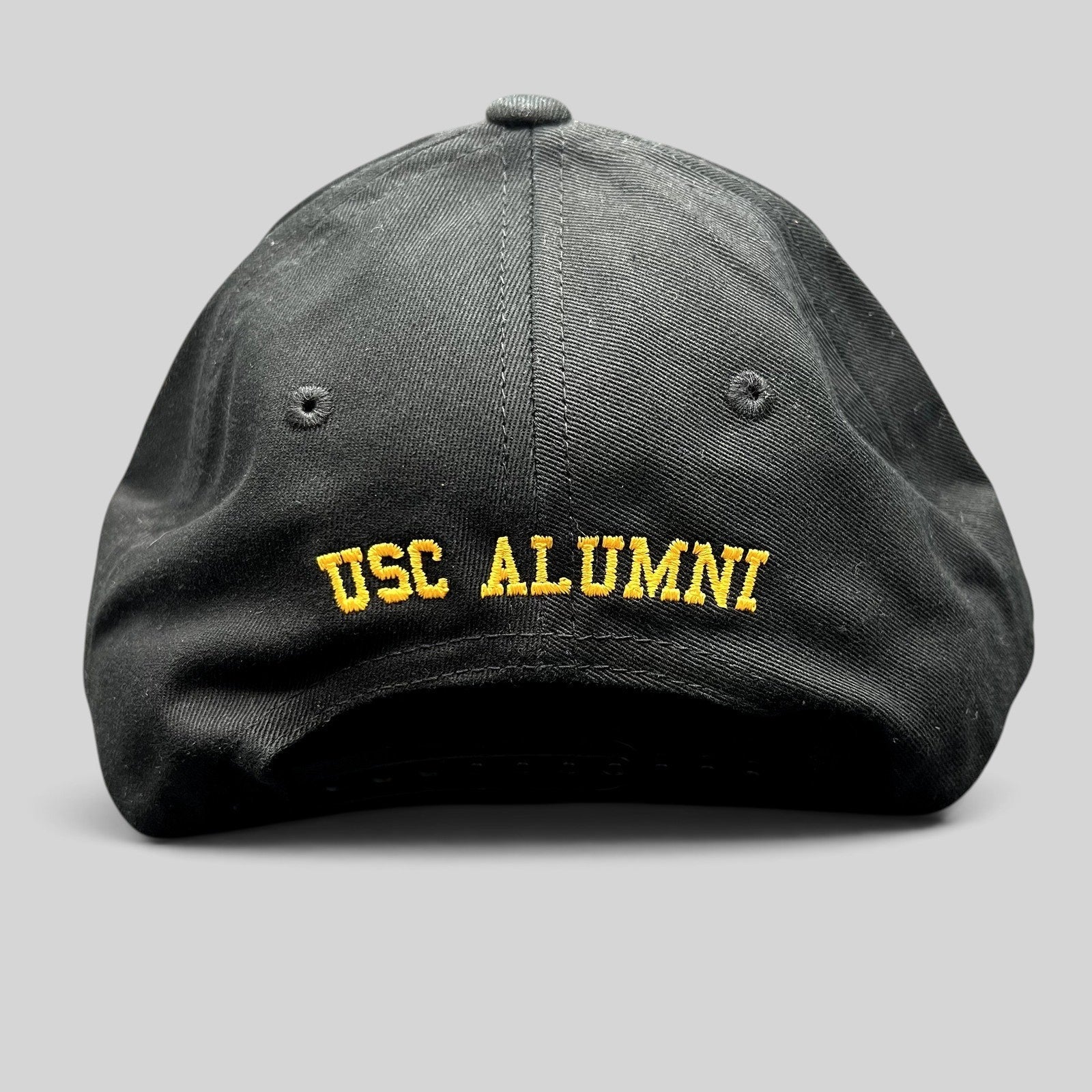 Raree Finds black USC Trojans Alumni snapback hat with yellow embroidered text on the back