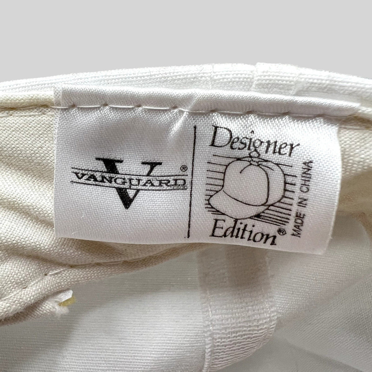 Raree Finds vintage Vanguard Designer Edition white hat interior fabric tag with branding and Made in China label