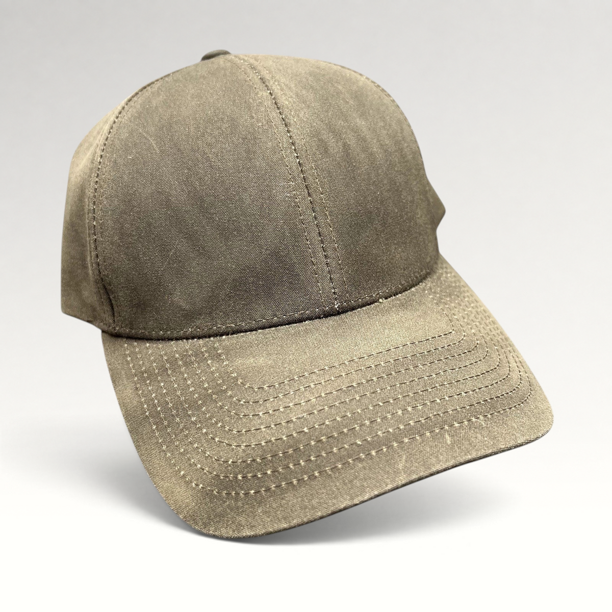 Raree Finds Varsity Headwear minimalist brown strapback cap with a structured crown and curved brim.
