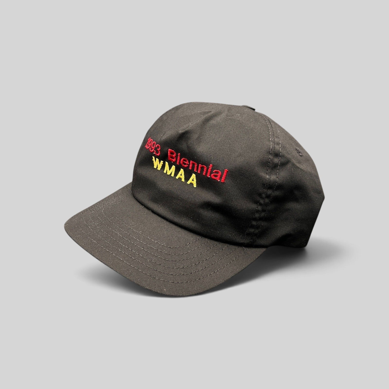 Raree Finds vintage 1993 WMAA Biennial black snapback cap with red and yellow embroidery and a flat bill