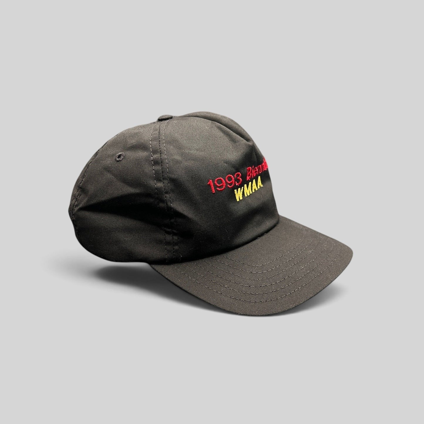 Raree Finds vintage 1993 WMAA Biennial black snapback cap with red and yellow embroidery and a flat bill