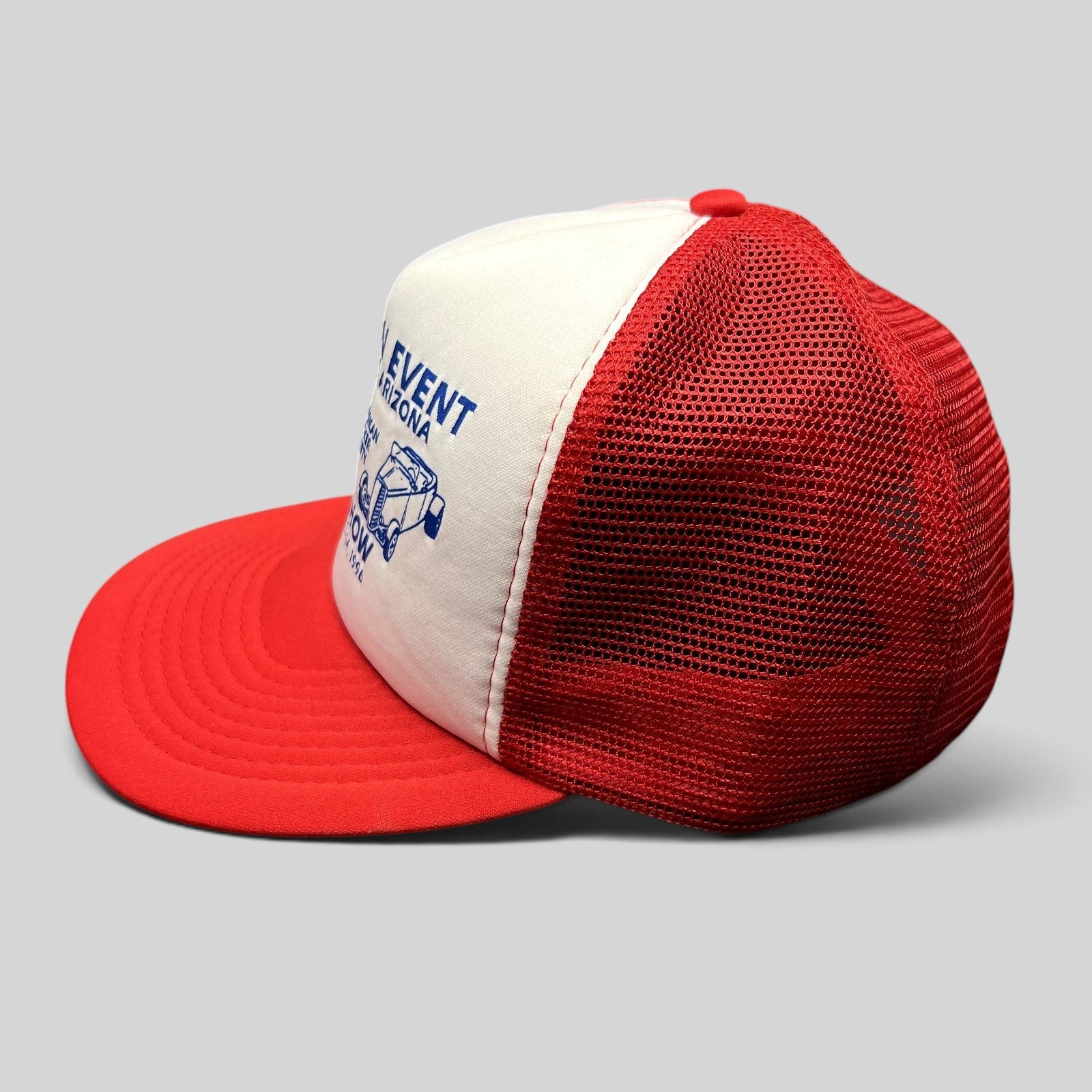 Raree Finds vintage 1996 Quartzsite car show trucker hat with a white foam front, red mesh back, and blue graphic.