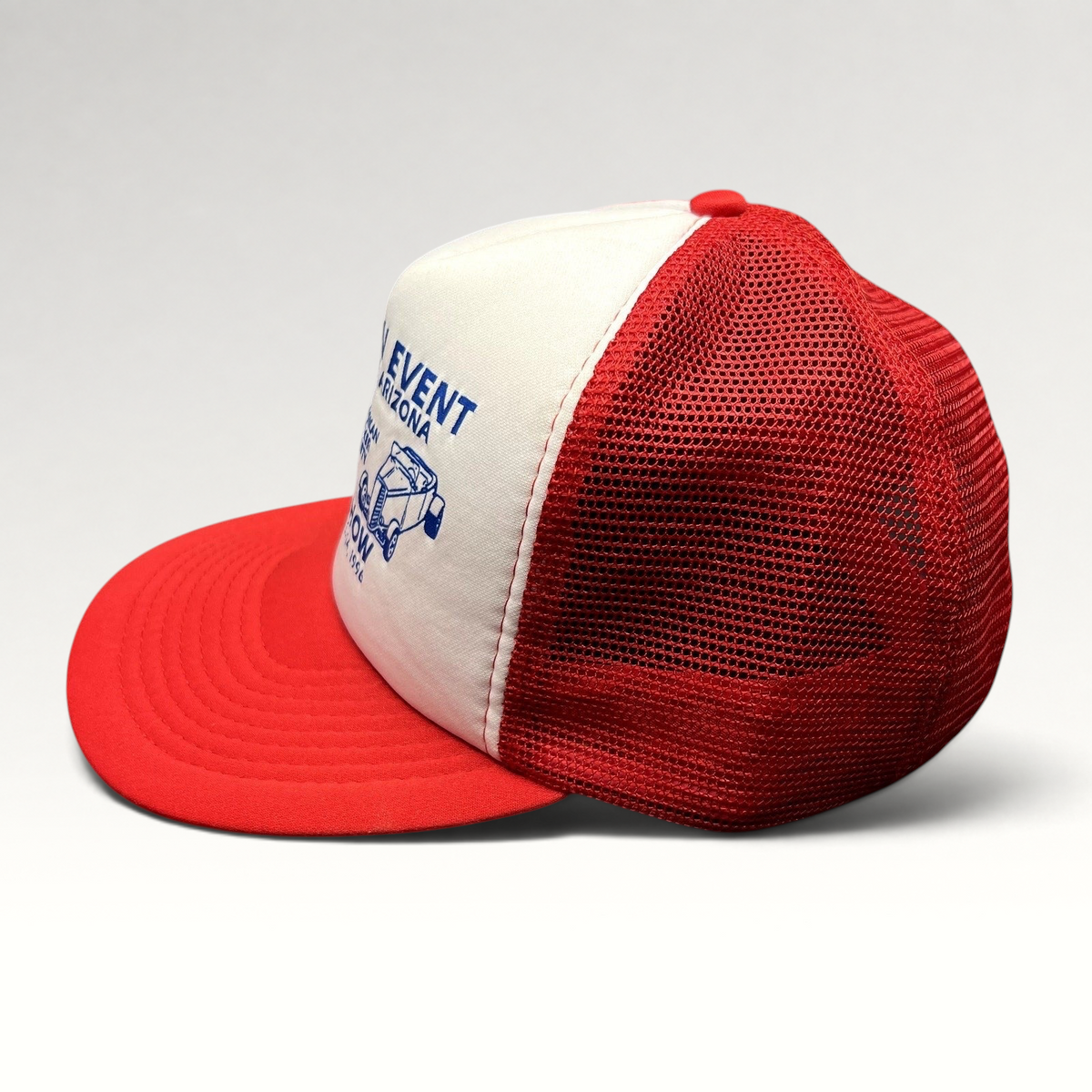 Raree Finds vintage 1996 Quartzsite car show trucker hat with a white foam front, red mesh back, and blue graphic.