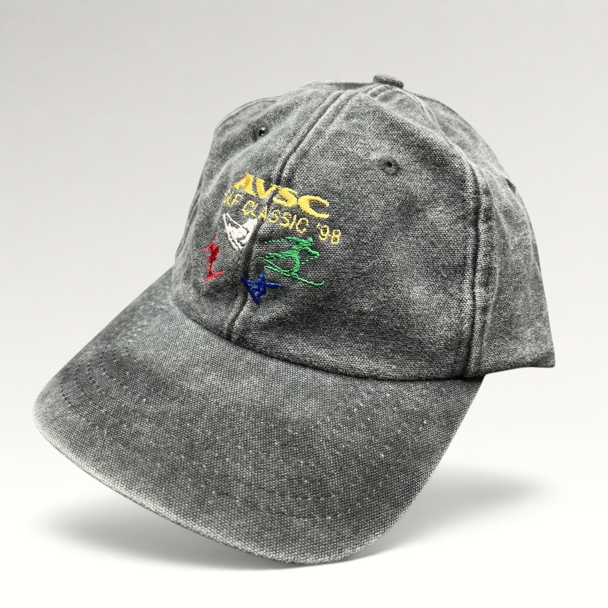 Raree Finds vintage 1998 AVSC Golf Classic Cobra strapback hat in washed black cotton with colorful embroidered graphics.
