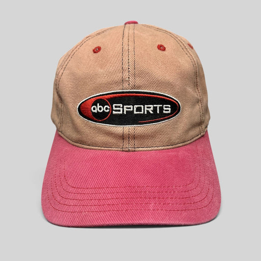 Raree Finds vintage ABC Sports strapback hat with a tan crown and pink brim featuring an embroidered front logo.