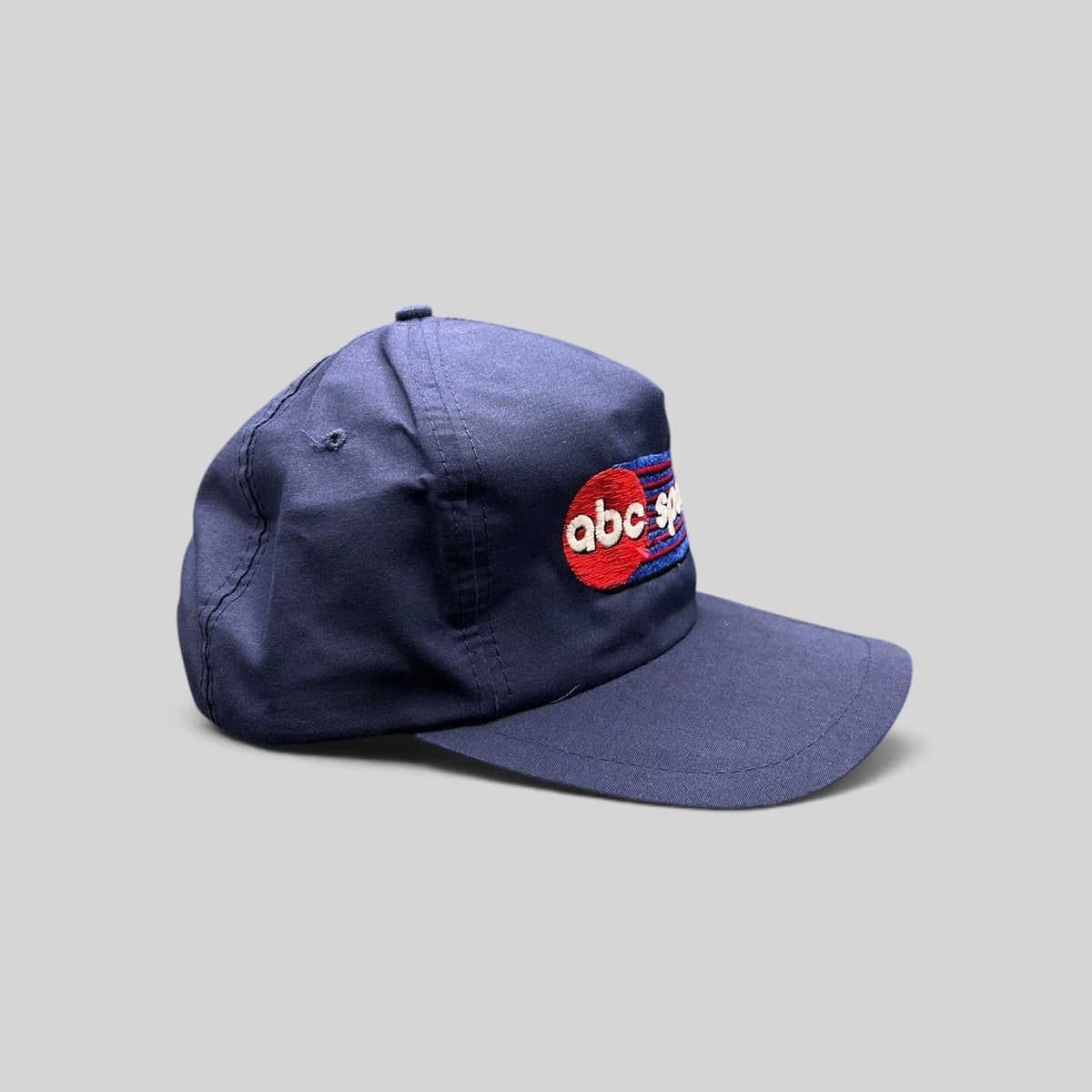 Raree Finds vintage 80s navy blue ABC Sports snapback hat with embroidered logo and structured crown
