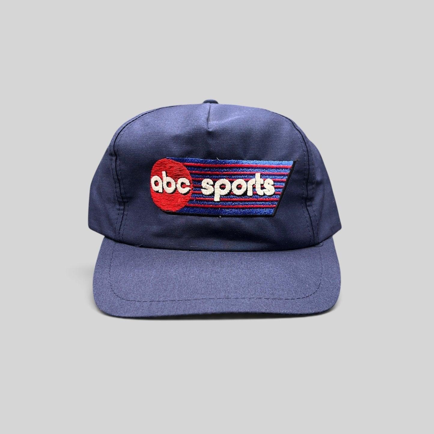 Raree Finds vintage navy blue ABC Sports snapback hat with embroidered logo and adjustable plastic closure