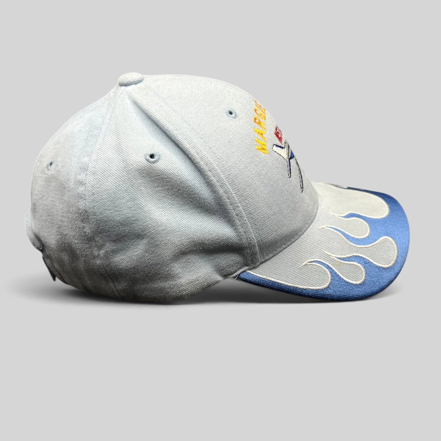 Raree Finds vintage light blue strapback hat with Margie Danz airplane embroidery and blue flame visor design