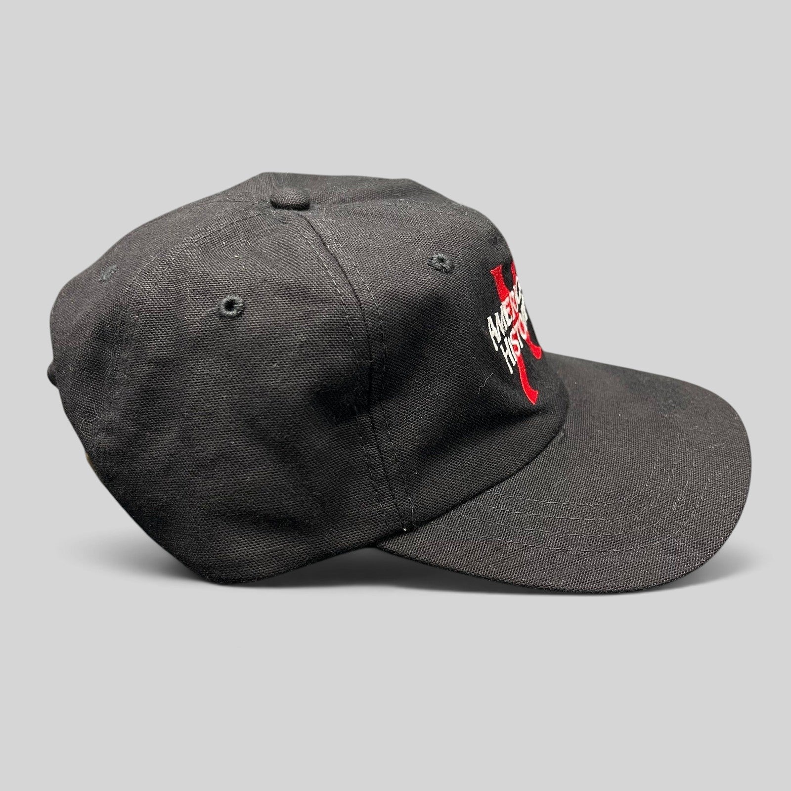 Raree Finds vintage 1998 American History X promotional black cotton snapback hat with red and white embroidered logo