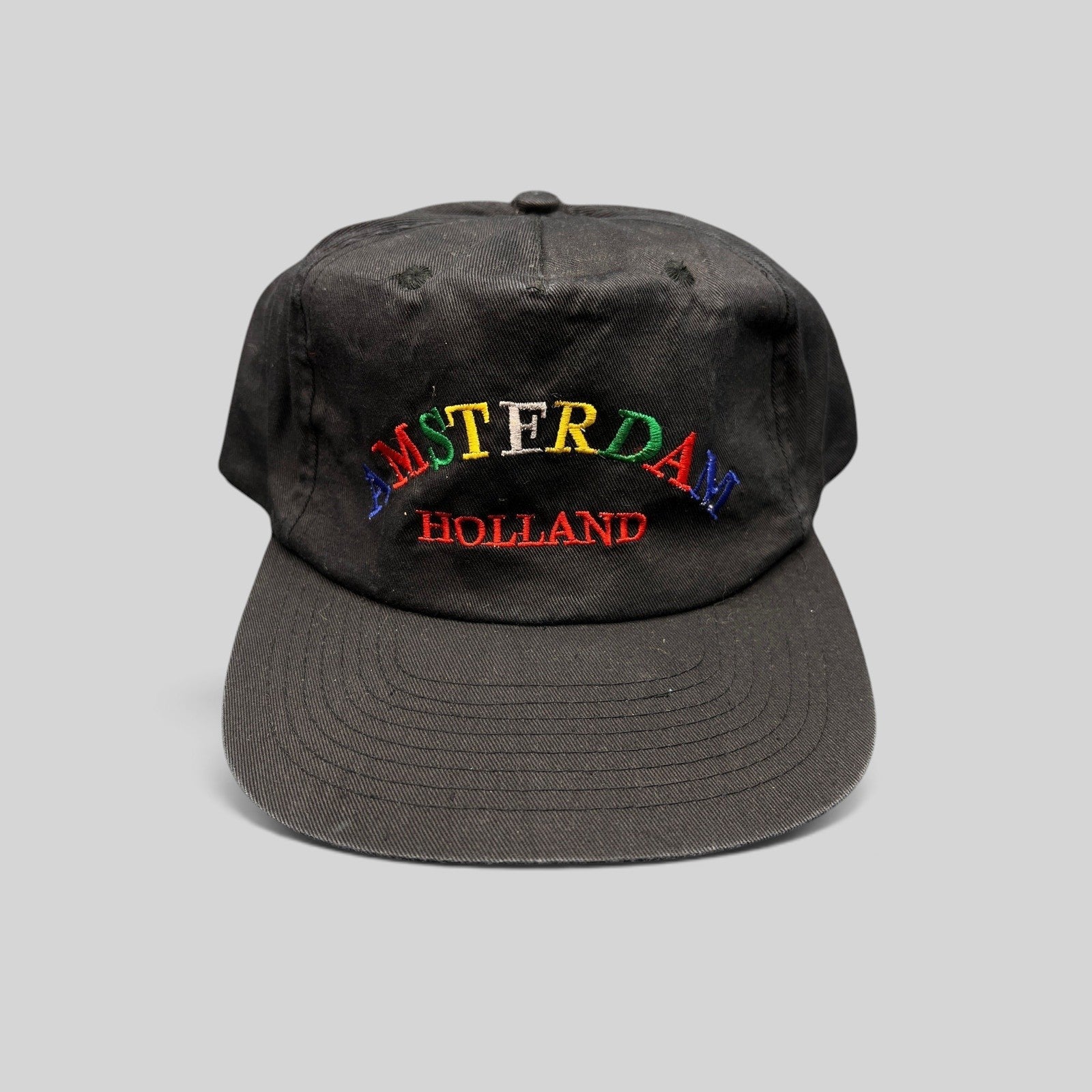 Raree Finds vintage 1990s black cotton snapback hat with colorful Amsterdam Holland embroidery