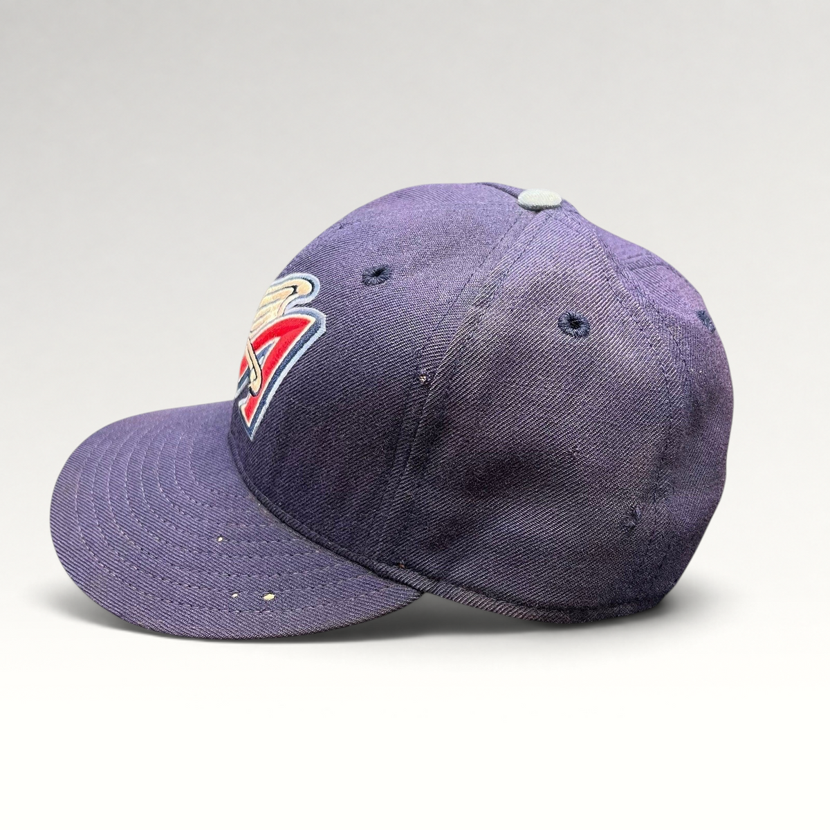 Raree Finds vintage navy wool New Era 59FIFTY Anaheim Angels fitted cap with winged A logo and distressed brim