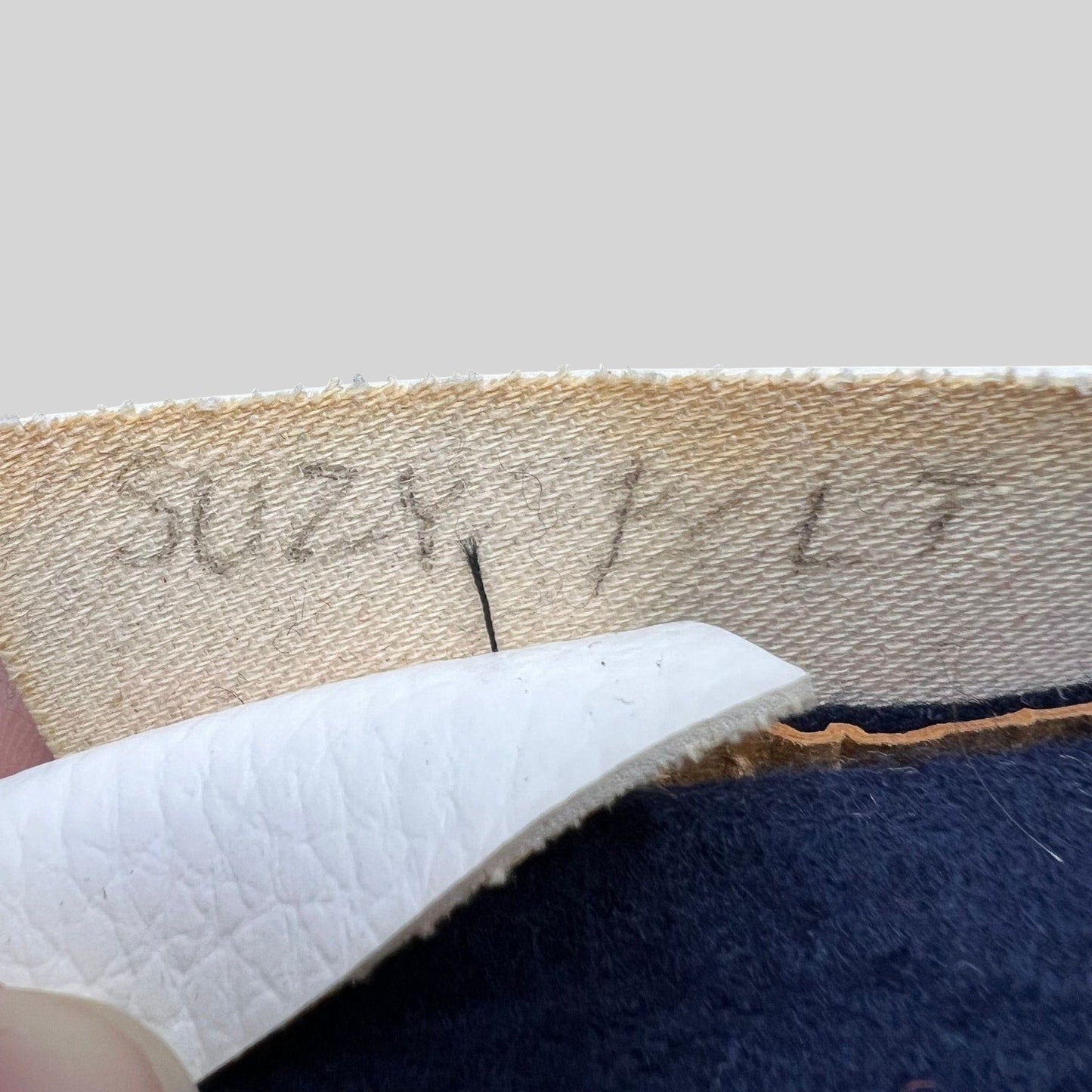 Raree Finds vintage California Angels snapback interior showing the leatherette sweatband with handwritten marking