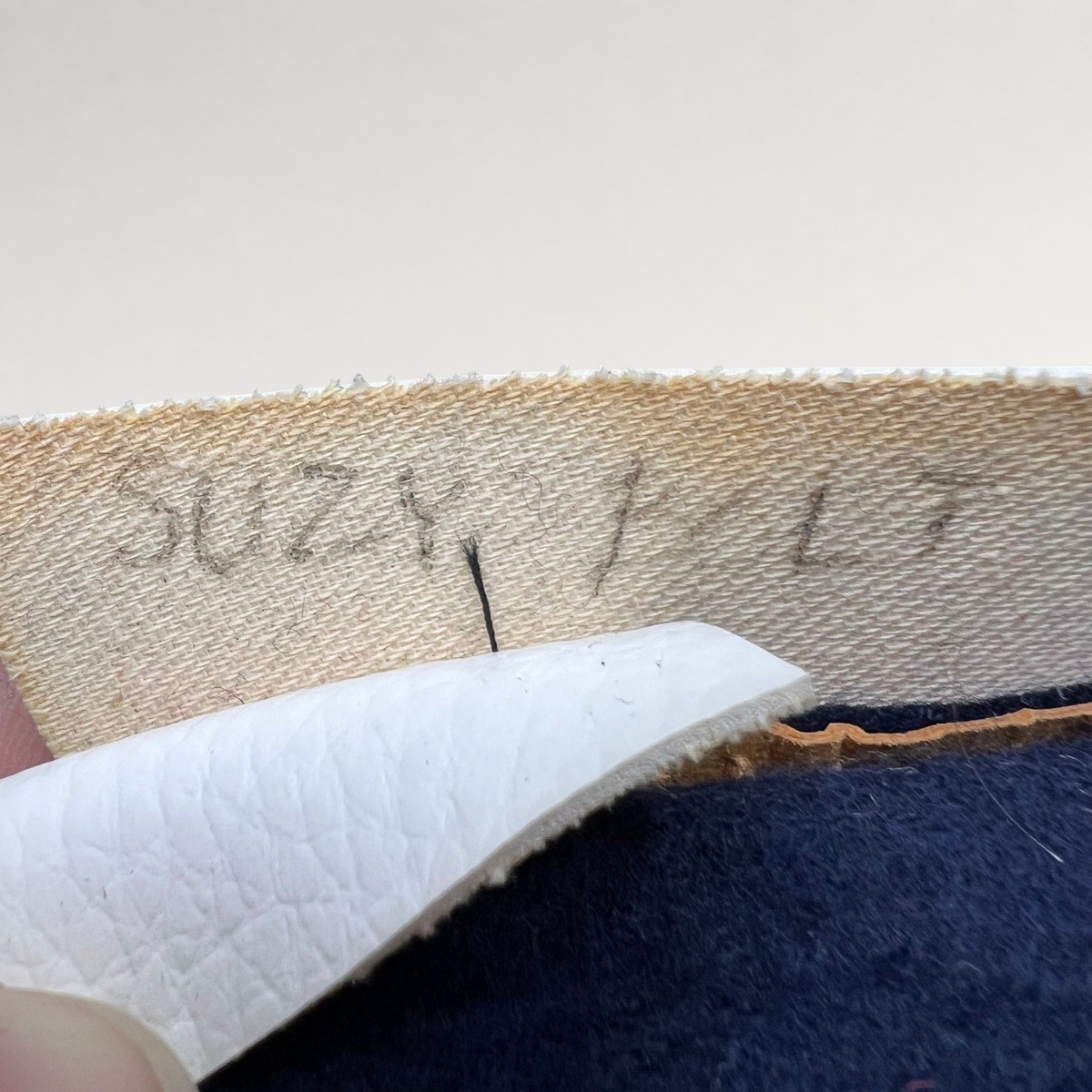 Raree Finds vintage California Angels snapback interior showing the leatherette sweatband with handwritten marking