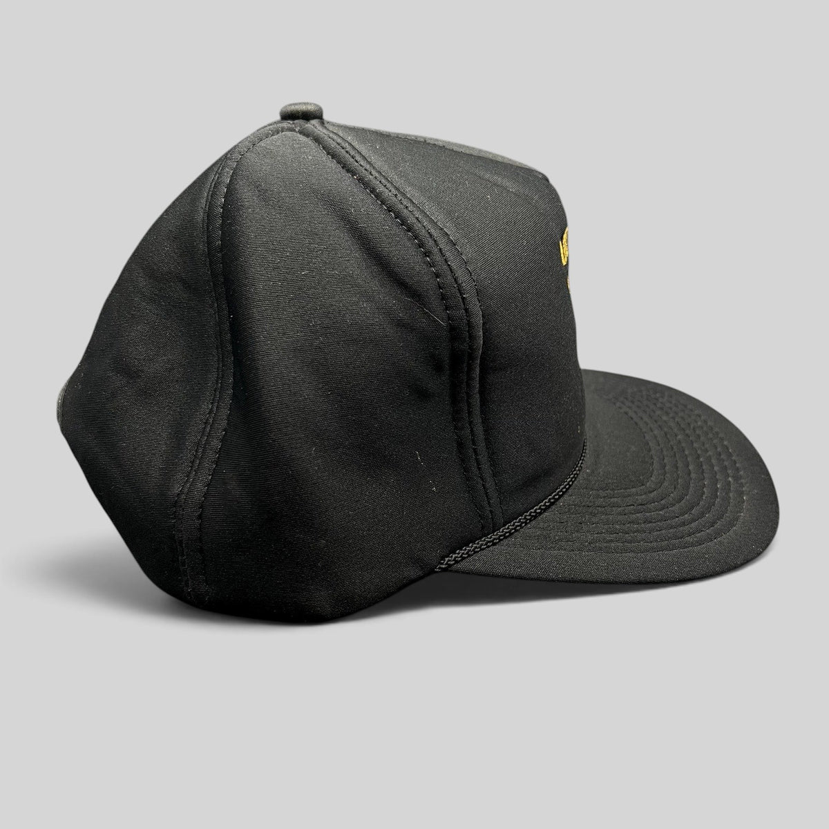 Raree Finds vintage black ARCO Marine snapback hat with foam front, black rope brim detail, and structured crown.