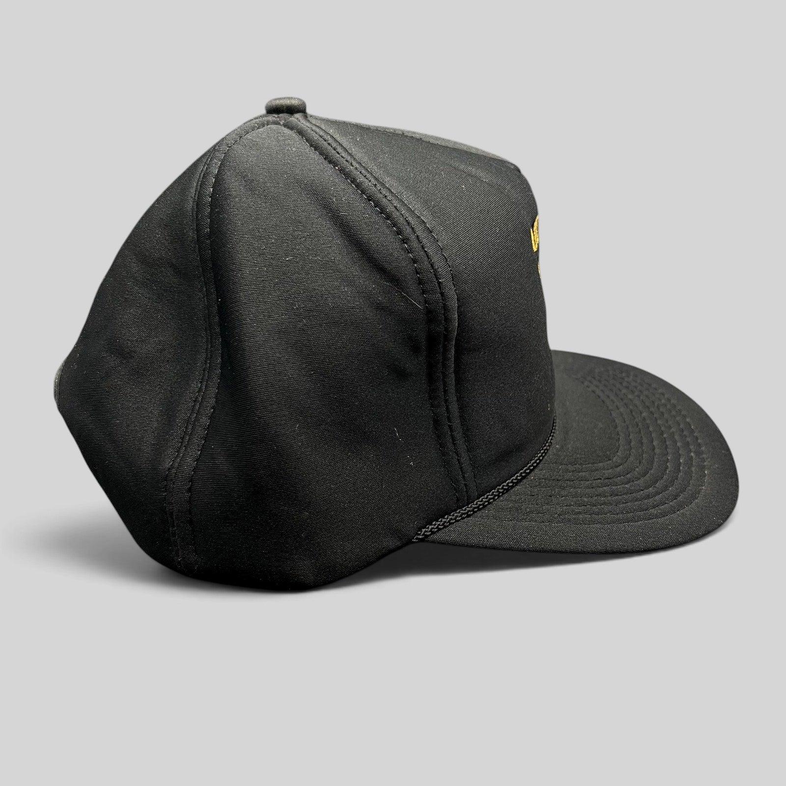 Raree Finds vintage black ARCO Marine snapback hat with foam front, black rope brim detail, and structured crown.