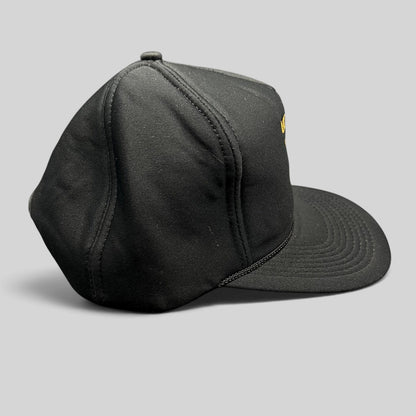 Raree Finds vintage black ARCO Marine snapback hat with foam front, black rope brim detail, and structured crown.
