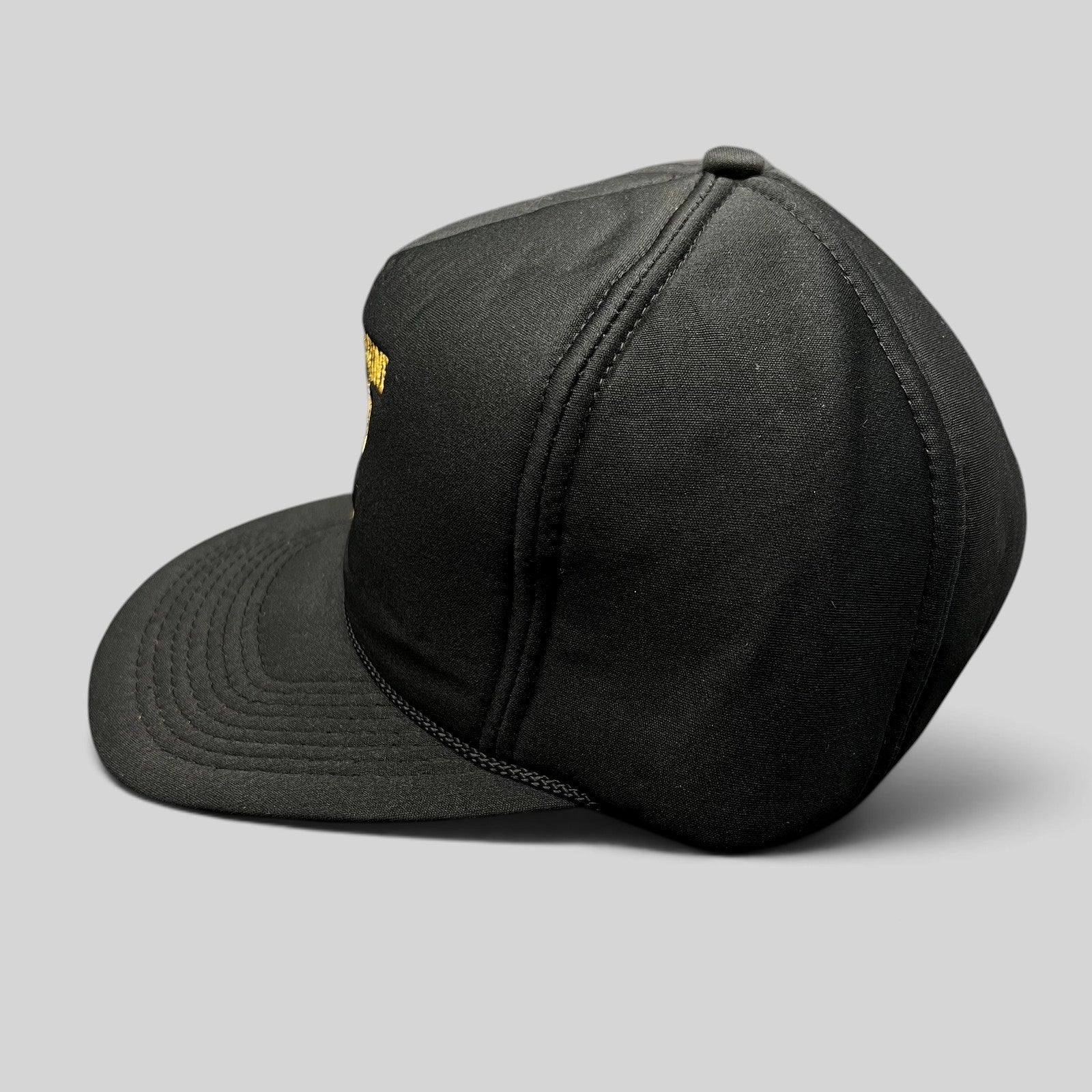 Raree Finds vintage black ARCO Marine snapback hat with foam front, rope brim detail, and structured crown.