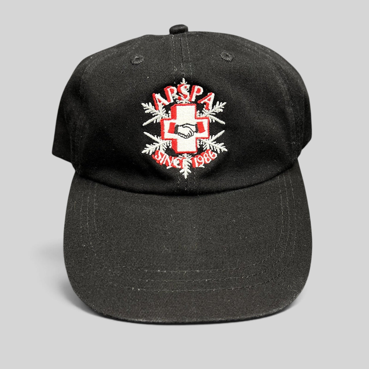 Raree Finds vintage black cotton ASPA Ski Patrol hat with embroidered cross logo and Since 1946 text