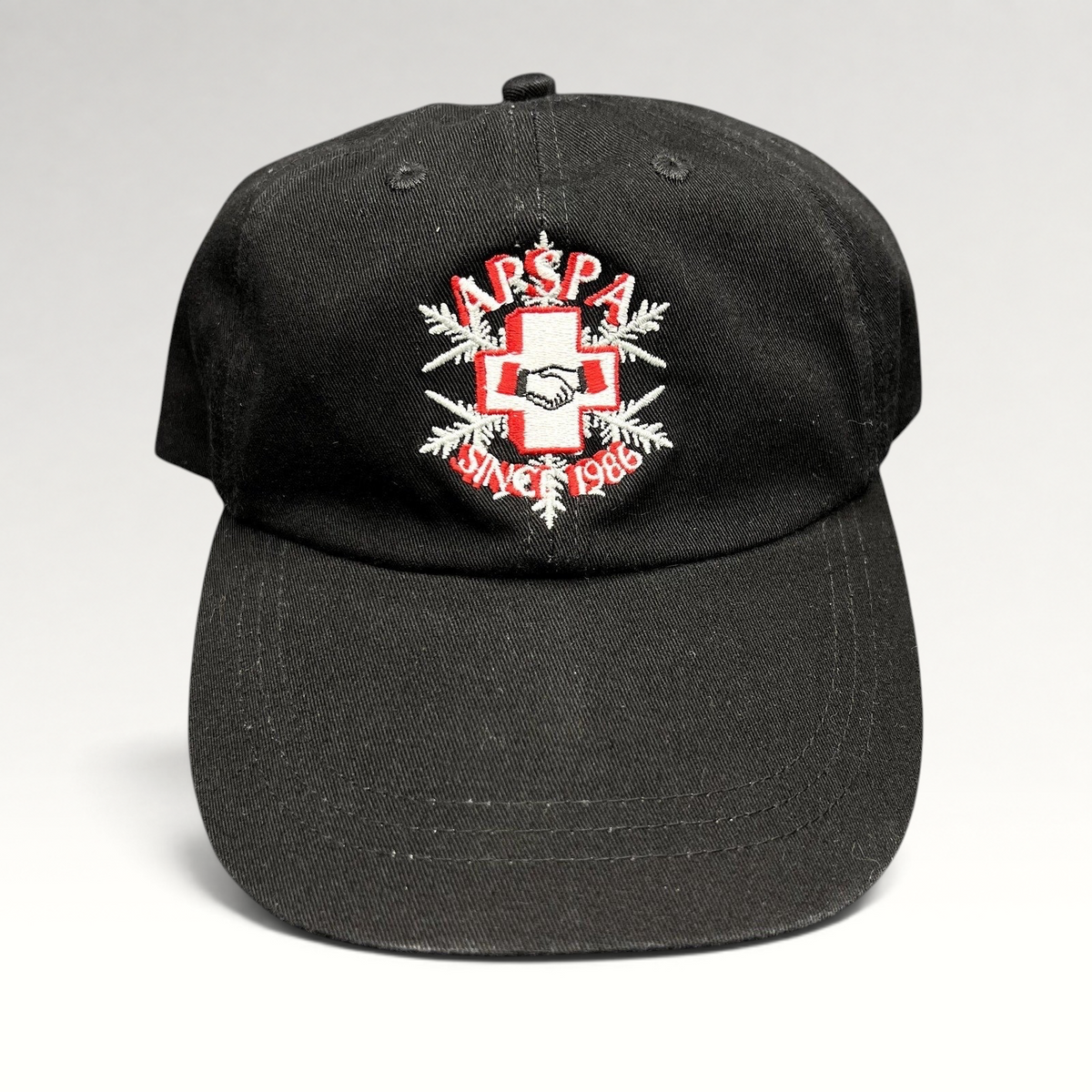 Raree Finds vintage black cotton ASPA Ski Patrol hat with embroidered cross logo and Since 1946 text