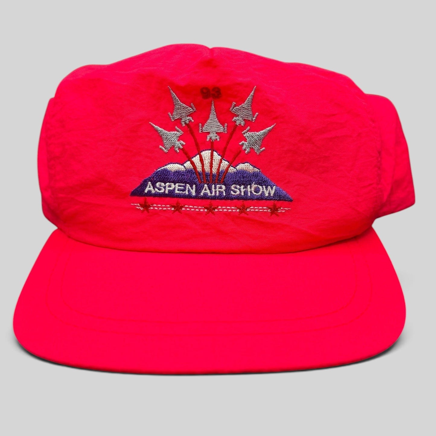 Raree Finds vintage 1993 neon red Aspen Air Show snapback hat with embroidered fighter jet and mountain graphic