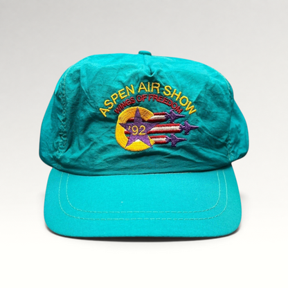 Raree Finds vintage 1992 Aspen Air Show teal nylon snapback hat with Wings of Freedom embroidered graphic