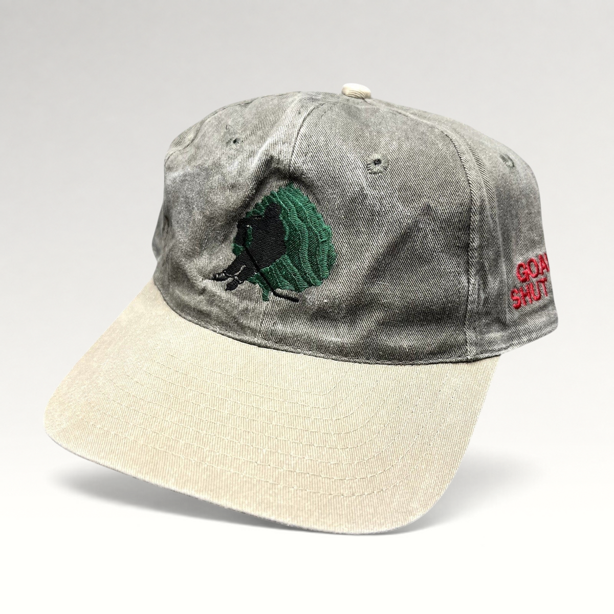Raree Finds vintage Aspen Fall Face Off hockey strapback hat with olive gray crown, khaki brim, and goalie embroidery.
