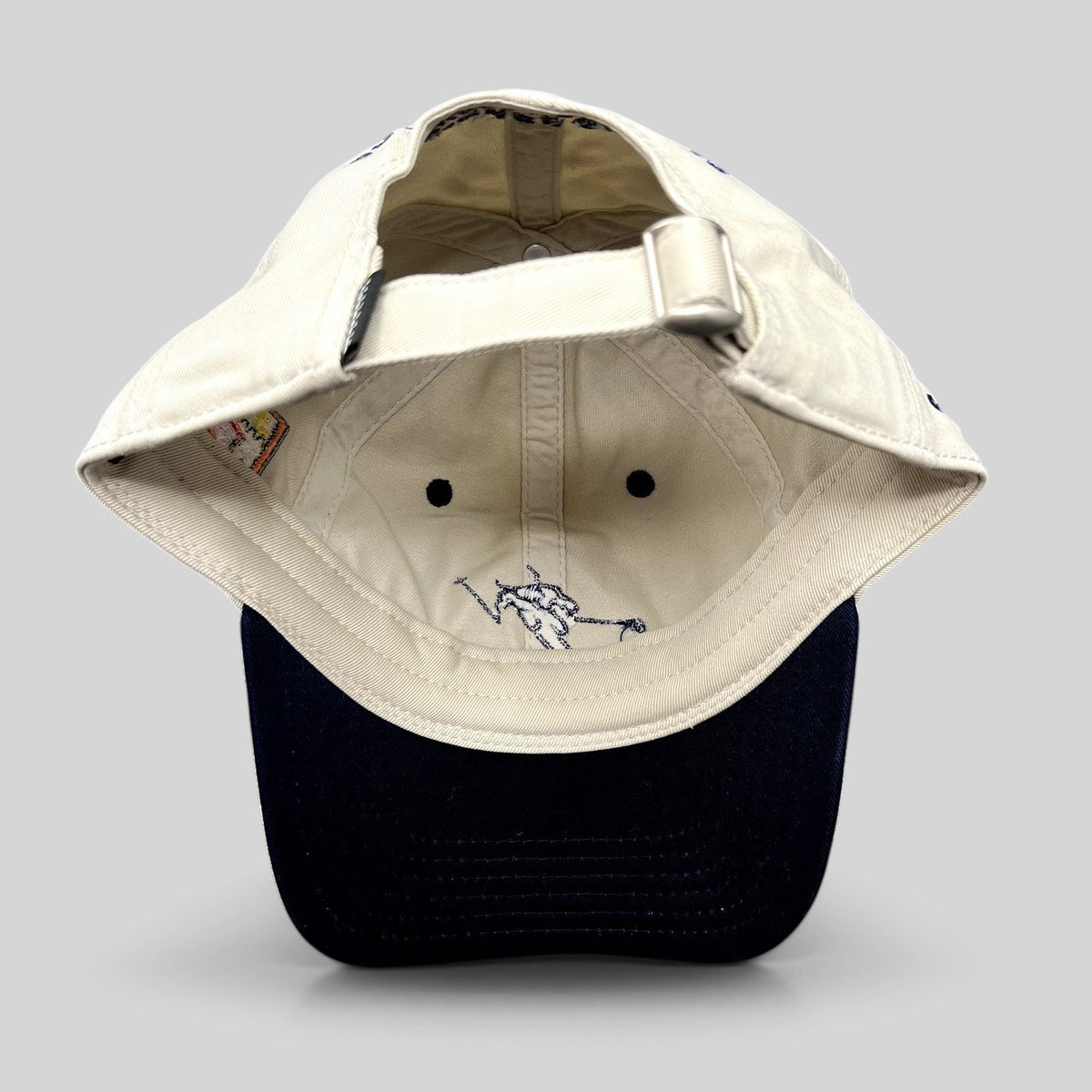 Raree Finds vintage Durrance Sports Aspen strapback hat interior showing embroidered skier logo and metal buckle