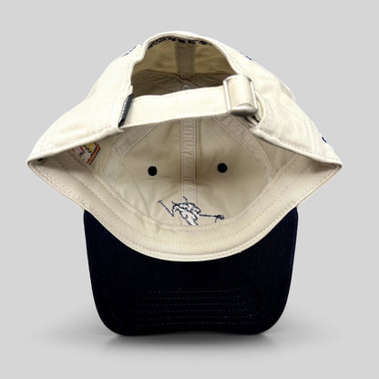 Raree Finds vintage Durrance Sports Aspen strapback hat interior showing embroidered skier logo and metal buckle