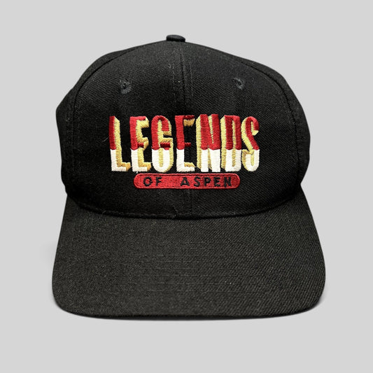 Raree Finds vintage Legends of Aspen black snapback hat with multicolor embroidered logo and classic 90s profile.