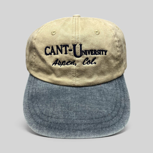 Raree Finds vintage Zkapz Cant-U-Niversity Aspen Colorado strapback hat with a khaki crown and faded blue brim.