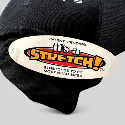 Raree Finds vintage 2004 Aspen Wintersköl stretch fit hat with It's a Stretch! tag on black cotton fabric