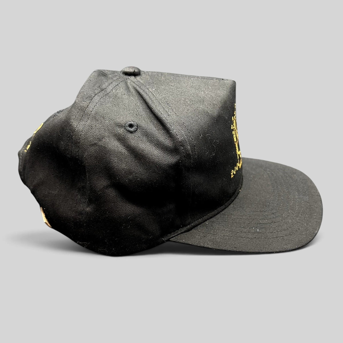Raree Finds vintage 2000 Aspen Wine Party VIP black strapback hat with gold champagne bottle embroidery