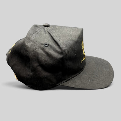 Raree Finds vintage 2000 Aspen Wine Party VIP black strapback hat with gold champagne bottle embroidery