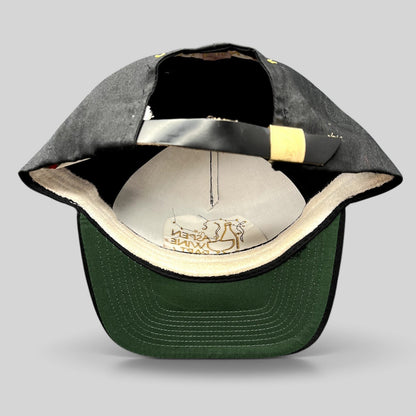 Raree Finds vintage 2000 Aspen Wine Party VIP strapback hat featuring a black crown, green undervisor, and brass buckle.