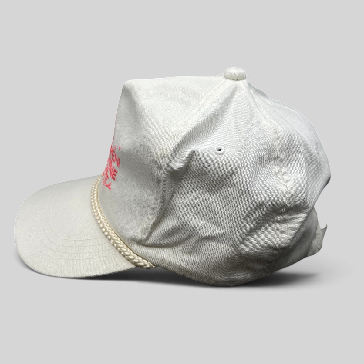 Raree Finds vintage 1991 white strapback hat with pink Aspen Wine Party graphic and classic rope brim detail