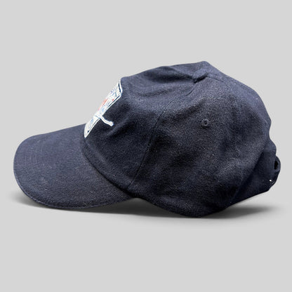 Raree Finds vintage 2002 Aspen Winternational strapback hat in navy with an embroidered freestyle skier patch
