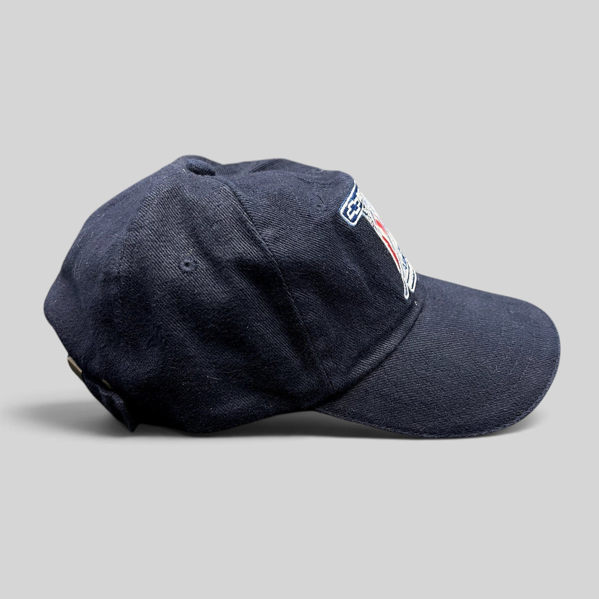 Raree Finds vintage 2002 Aspen Winternational navy strapback hat with embroidered Chevrolet Truck and skier patch