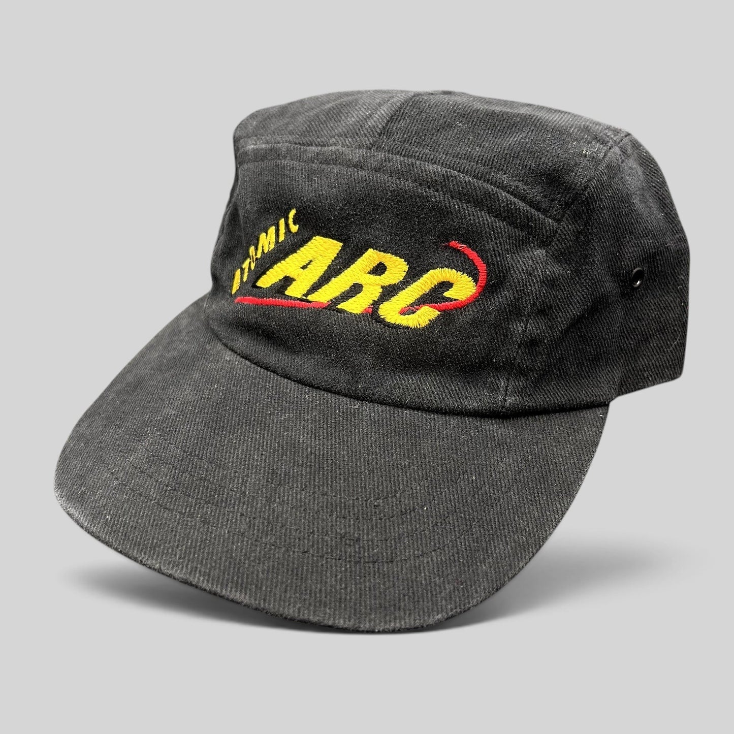 Raree Finds vintage black cotton Atomic ARC strapback hat with yellow and red embroidered logo